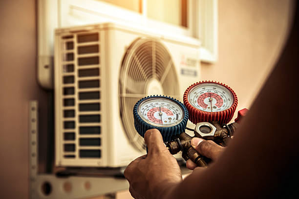 Professional Heat Pump Repair technician working in Cathedral City, CA